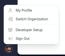 The profile menu open at the bottom of the left rail