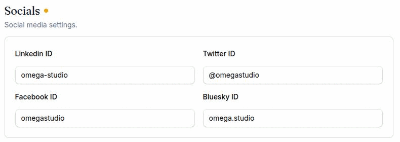 Settings → General, showing the Socials card with the LinkedIn, Twitter, Facebook and Bluesky ID fields filled in