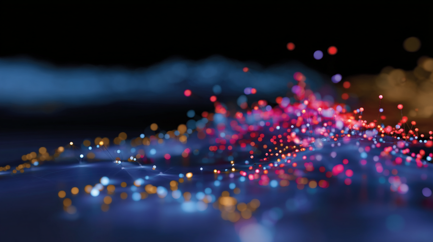 A blue and red light show, resembling a firework display, is captured in a dark blue background. The image features a multitude of brightly colored dots, which create a visually striking and dynamic scene.